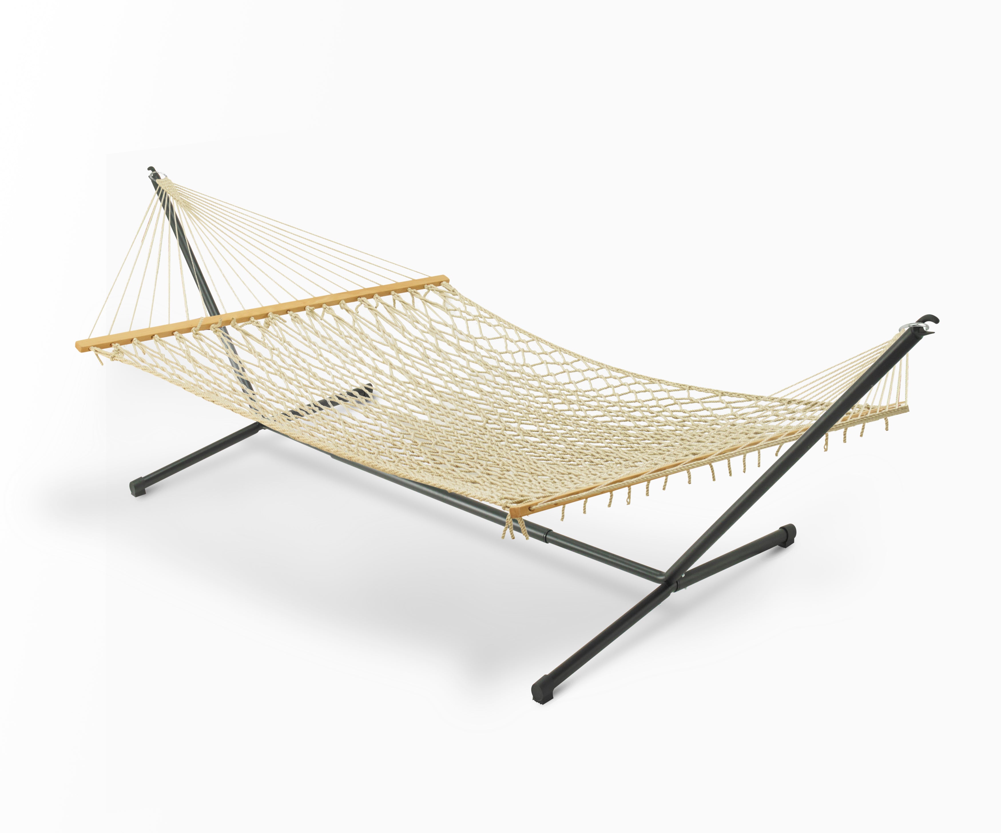Full view of natural rope hammock hung on a black metal stand